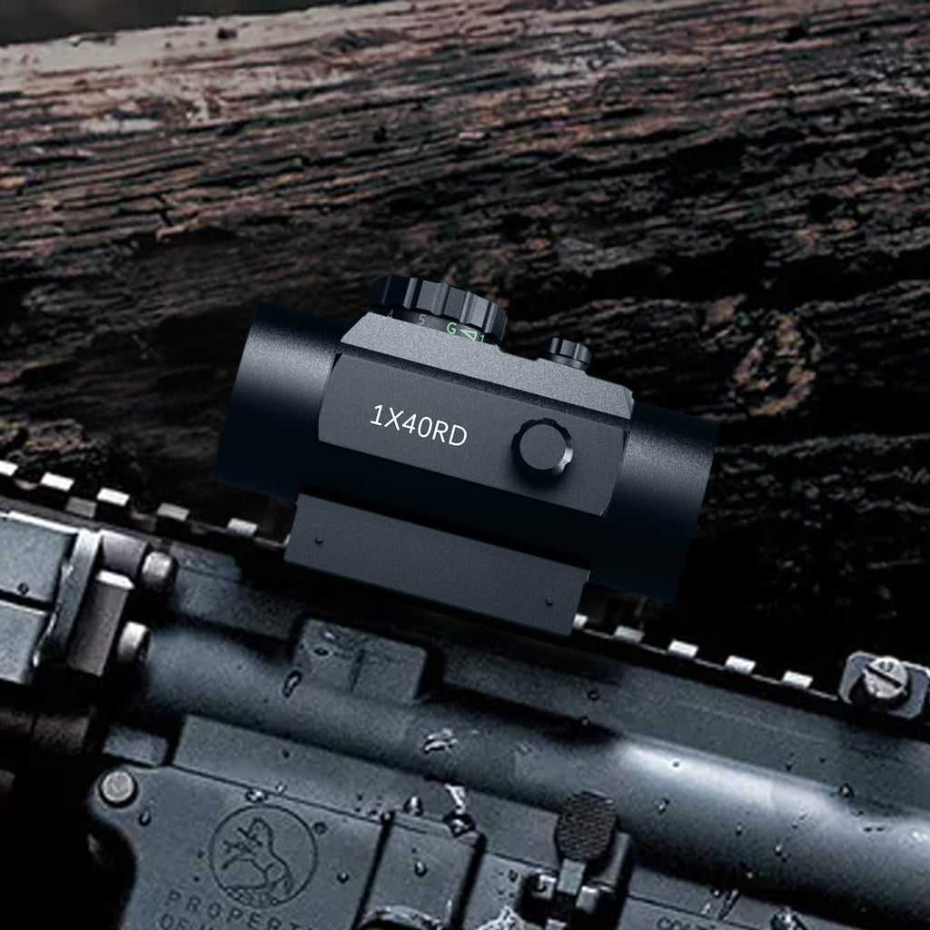 Aquilifer 1×40 red dot sight mounted on a firearm, featuring a black finish and adjustment knobs on top.