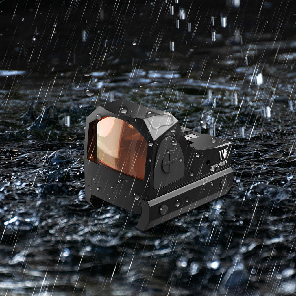Aquilifer red dot sight on a wet surface with raindrops, featuring a sleek black design and illuminated reticle.
